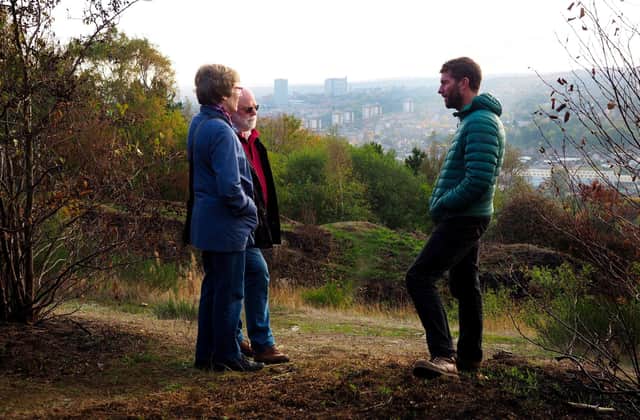 Sheffield Council Woodlands officer Jon Dallow talking to Peter and Louise Bull of Friends of Parkwood Springs.