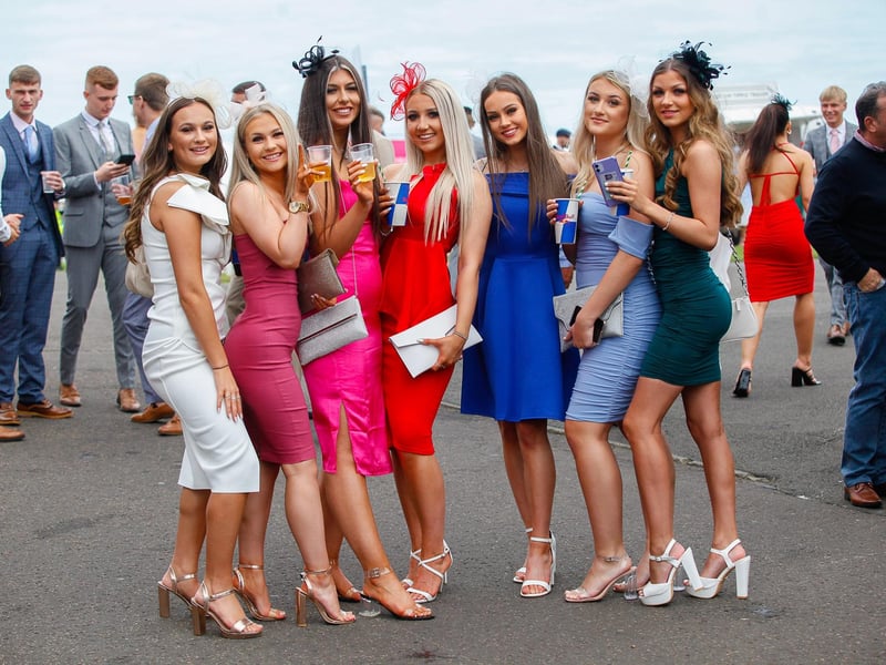 The ladies pose for our photographer on their way back to their seats