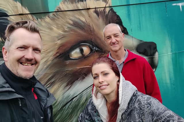 Coun Paul Turpin, Sarah Yates Aka Faunagraphic And Local Nature Photographer Kev Dunnington by the mural at Meersbrook Park pavilion.