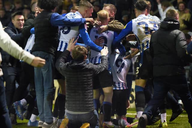 Sheffield Wednesday players and fans celebrating together earlier this season. Pic Steve Ellis