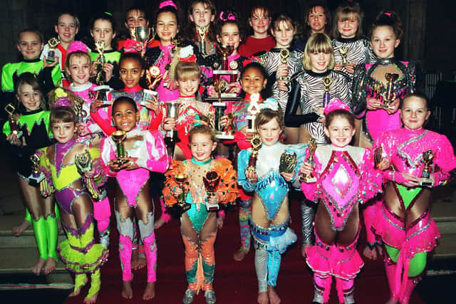 Pictured at St Aiden's Church, Manor Lane, Sheffield, where members of the Helen Taylor School of Dance are seen with the medals and trophies they won at the annual dance competition held at the Richmond Holiday centre, Skegness, in 1996