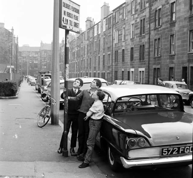 Children playing in the 'no vehicles zone' of Dalry's Caledonian Place in 1966.