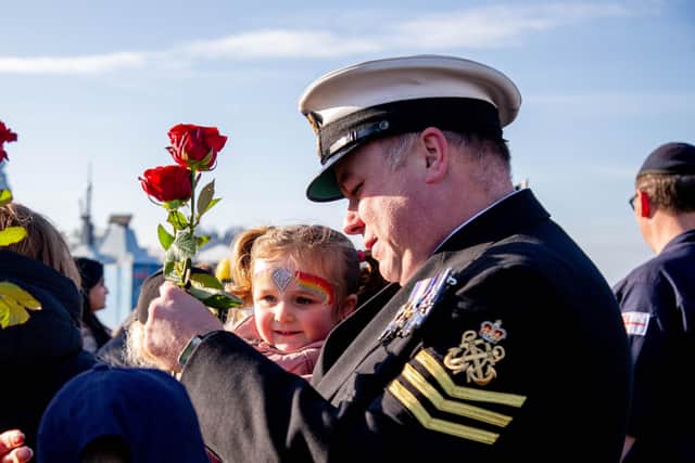 Graham Gregory with daughter Iris after HMS Diamond returned to Portsmouth. Picture: Habibur Rahman