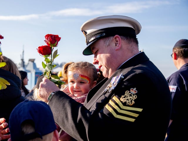 Graham Gregory with daughter Iris after HMS Diamond returned to Portsmouth. Picture: Habibur Rahman