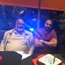 Bashir, with his sons Kamran and Ray at a birthday meal.