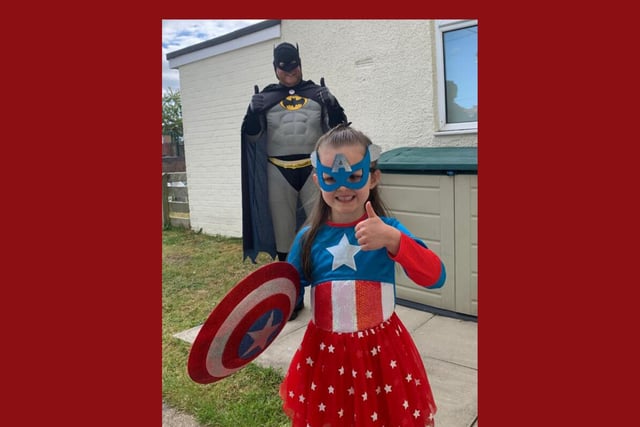 Jon and Macey managed to coordinate their efforts for a superhero-themed day of fancy dress.