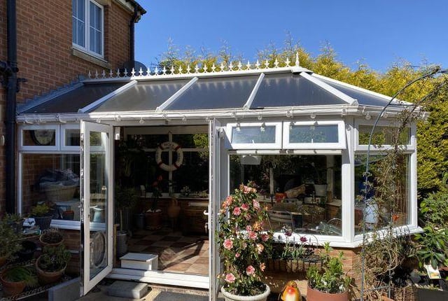 This house has a utility area, conservatory and en-suite for the master bedroom.