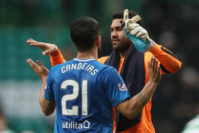 Daniel Joao Santos Candeias of Rangers with Wes Foderingham of Rangers after a Scottish Premier League match between Celtic and Rangers at Celtic Park: Ian MacNicol/Getty Images