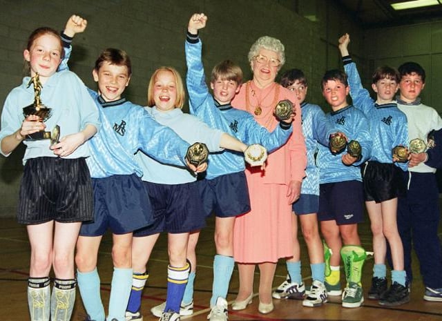 Mayor Dorothy Layton here presenting trophies to children at Barnburgh School.