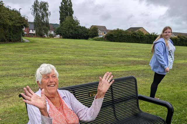 Sandra Blockley MBE at her new bench in Thurcroft.