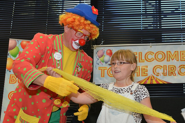 Bungle the Clown doing a magic trick with Maddison Murray during the Circus Stars event in the Central Library. Does this bring back memories of 2015?