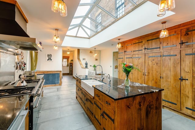 The heart of the home is the bespoke handmade, high quality kitchen with its granite counter tops, large centre island with a double Belfast sink and breakfast seating area.