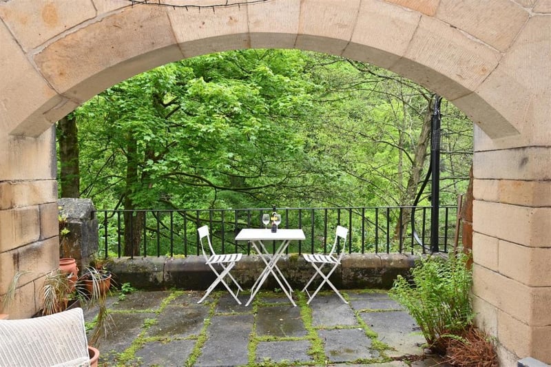 With archways leading to the open terrace and the external stairs up to the ground floor entrance, this is a perfect spot for outdoor dining.