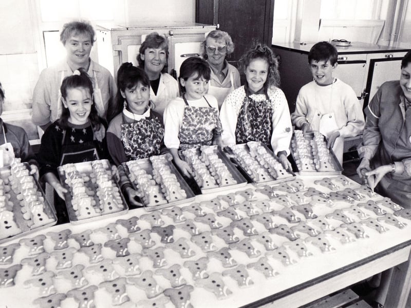 Children in Need also made its first appearance in the 1980s. Pupils at Woodthorpe First and Middle School, Sheffield, at work making and decorating Pudsey biscuits with the help of the canteen staff in aid of the 1989 Children in Need Appeal
