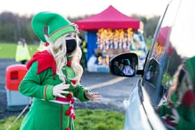 At the drive in cinema an elf can come to take children's Christmas lists to Santa.