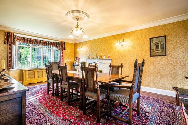 The dining room features sturdy timber flooring.
