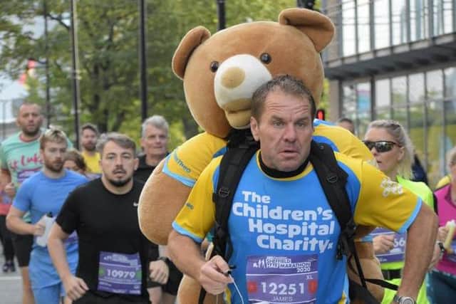 James approaching the finish line during the Sheffield Half Marathon.