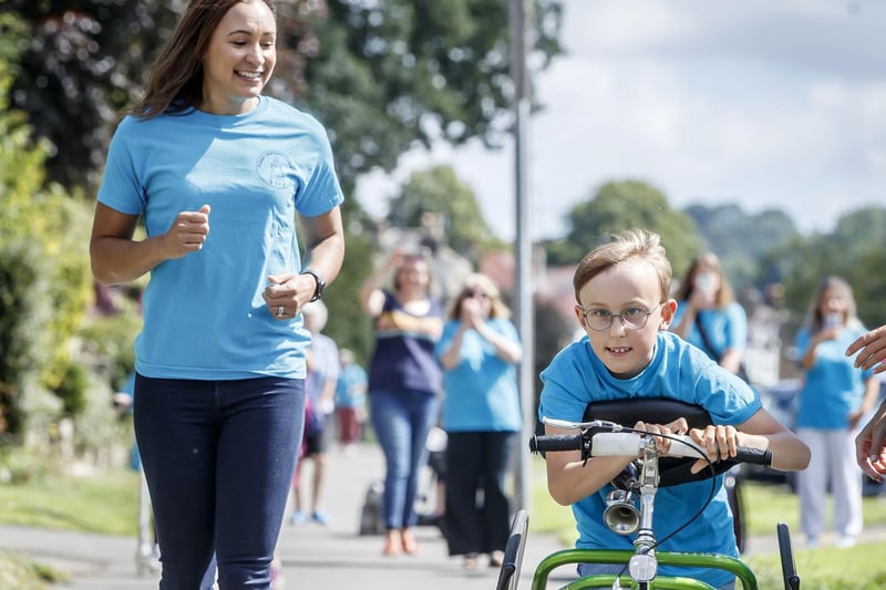 Tobias Weller, who has cerebral palsy and autism, was joined by Sheffield star Olympic athlete Jessica Ennis-Hill as he completed his second marathon challenge. Tobias was inspired by pandemic hero Captain Tom Moore to raise more than £150,000 for Sheffield Children’s Hospital and Paces School for children with neurological conditions