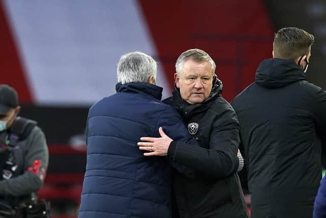 Chris Wilder, pictured with Jose Mourinho, wants to bolster his squad: Andrew Yates/Sportimage