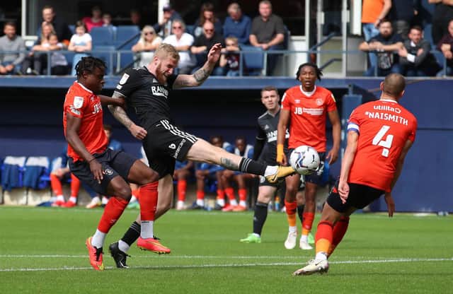 Oli McBurnie of Sheffield United takes a shot on goal against Luton Town: Simon Bellis / Sportimage