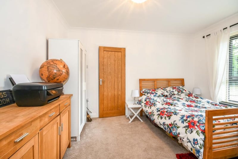 The third bedoom is a double, ground-floor bedroom with a double-glazed window to the front, double radiator and coving to the ceiling and a door through to its own en suite.
