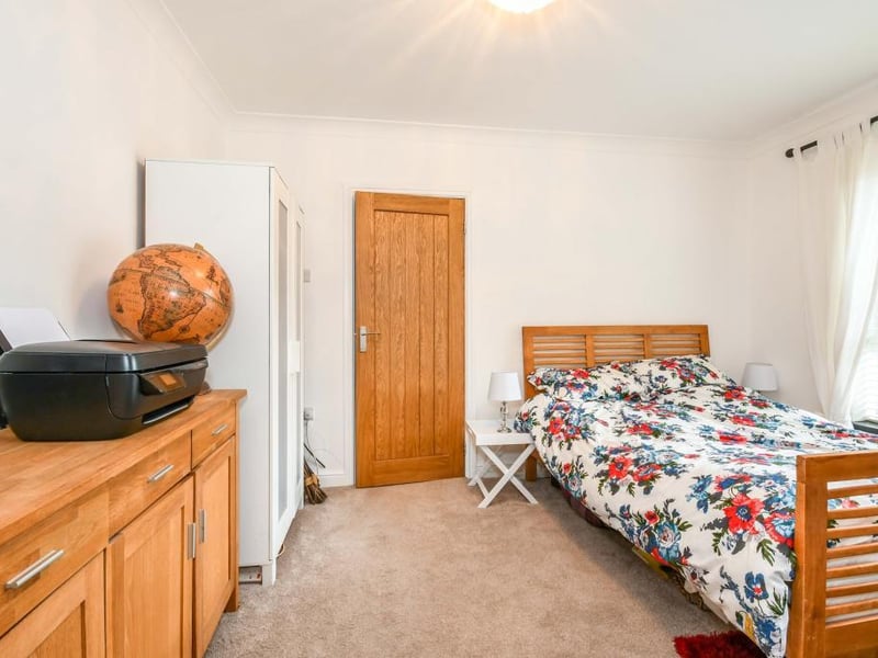 The third bedoom is a double, ground-floor bedroom with a double-glazed window to the front, double radiator and coving to the ceiling and a door through to its own en suite.