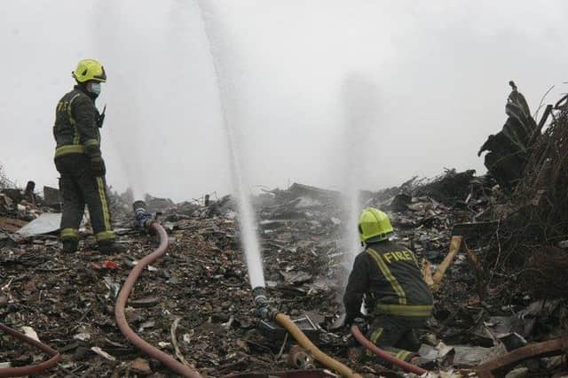 Firefighters pump 5,000 litres of water per minute on blaze.