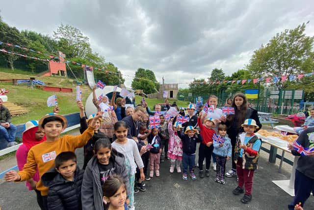The community at Pitsmoor Adventure Playground on June 4 for a celebration lunch to mark the Platinum Jubilee and the Queen's Award.