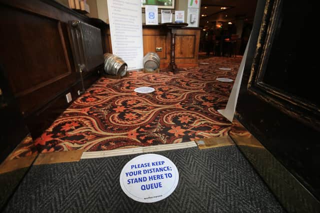 Pubs and restaurants have taken a variety of approaches to social distancing and track and trace unde rthe Government guidelines. Picture: Chris Etchells
