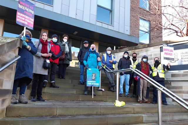 Striking UCU members in December outside the Sheffield University management School. The union has announced moe strike days for February and March