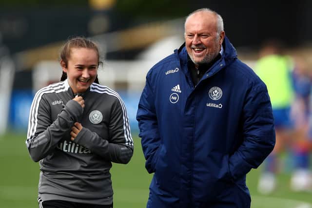 Neil Redfearn, manager of Sheffield United Women, speaks with Lucy Watson (Jacques Feeney - The FA/The FA via Getty Images)