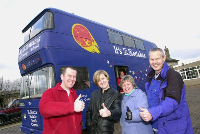 Youth workers Nick Fairman (left) and Maria Hollingshead (second left), and area youth workers Karen Smith and Stephen Evans were pictured with the Doncaster youth service double decker bus in 2001