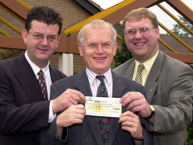 Doncaster Roundtable presented St John's Hospice with a cheque for £1,220 in 2000. Our picture shows Roundtable representatives Kevin Kerley (left) and Andy Leslie handing the money over to John Clark, chairman of the Doncaster Cancer detection rust and the St John's Hospice Appeal.