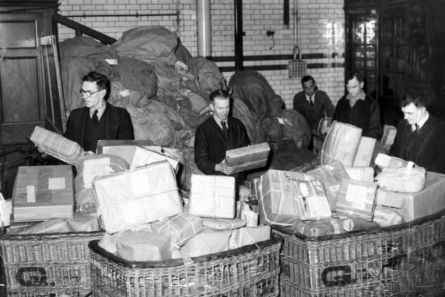 Christmas parcels being sorted at Sheffield GPO... December 1952