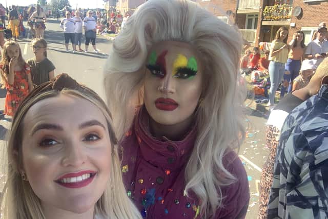 Star reporter Alana Roberts with a drag queen during the Everybody's Talking About Jamie street party on Deerlands Avenue