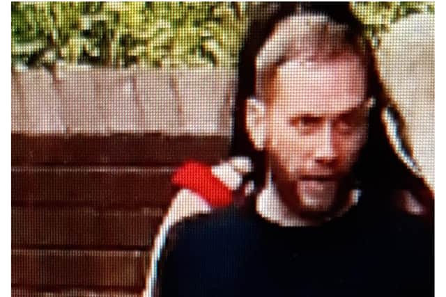 Police want to trace this man over an attack outside Dempseys bar in Sheffield city centre