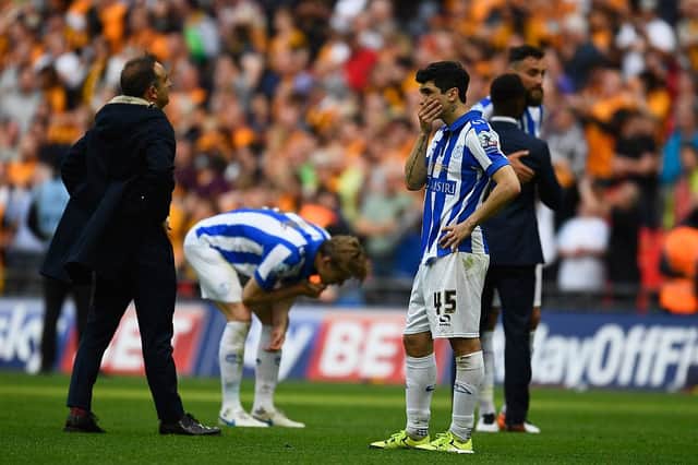 LONDON, ENGLAND - MAY 28:  Sheffield Wednesday players including Fernando Forestieri (45) are distraught at the end of the Sky Bet Championship Play Off Final between Hull City and Sheffield Wednesday at Wembley Stadium on May 28, 2016 in London, England.  (Photo by Mike Hewitt/Getty Images)