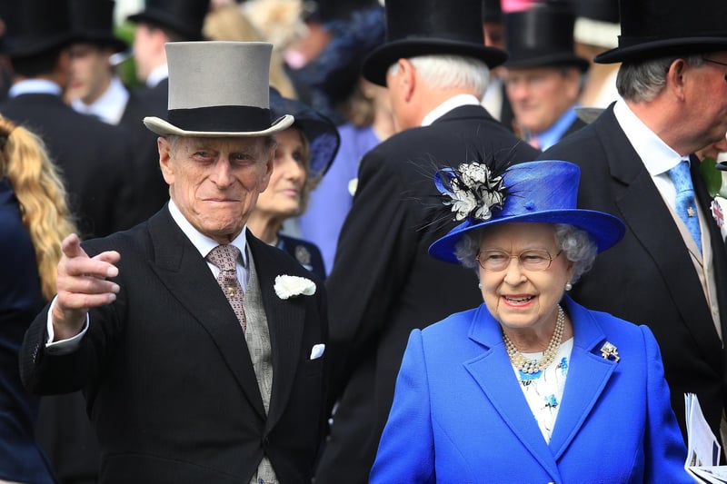 Queen Elizabeth II and Prince Philip, Duke of Edinburgh watch the horses in the parade ring before The Derby on June 2, 2012 in Epsom, England. For only the second time in its history, the UK celebrates the Diamond Jubilee of a monarch.