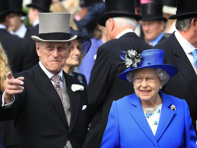 Queen Elizabeth II and Prince Philip, Duke of Edinburgh watch the horses in the parade ring before The Derby on June 2, 2012 in Epsom, England. For only the second time in its history, the UK celebrates the Diamond Jubilee of a monarch.
