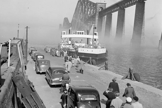 Cars queue at South Queensferry to board the ferry across the Forth in May 1964.