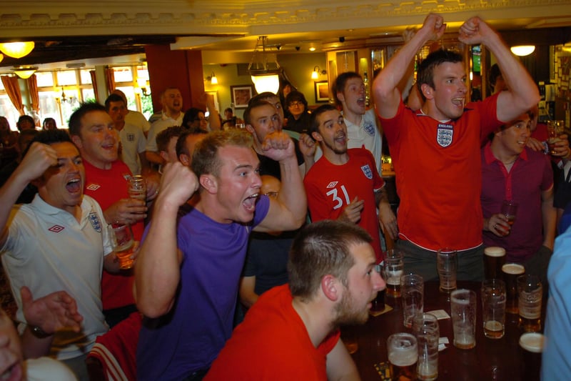 A rare high point for these England fans as they see their team score against Germany in 2010. But it was the Germans who ran out as 4-1 winners.
