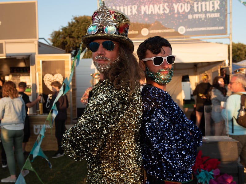 Tom Clifford and Kiron Smith from the Glitter Makes You Fitter clothes stall.
(290821-255)