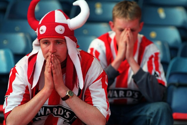 Blades fans are left distraught after their side is sunk by David Hopkin's injury time goal for Crystal Palace in the 1999 Division One play-off final at Wembley.
