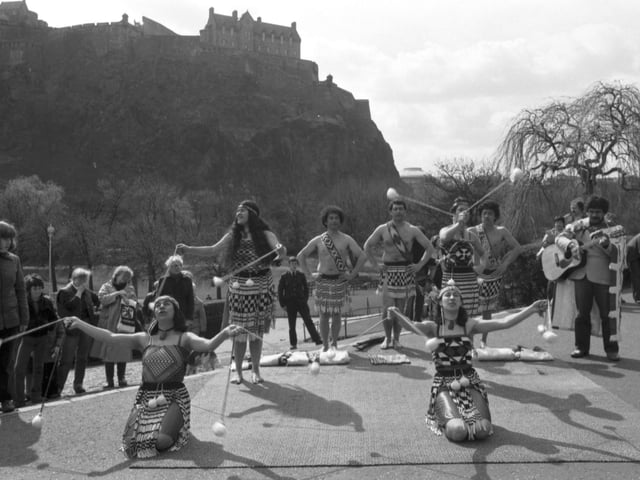Maori singers and dancers performing in traditional costume in Princes Street gardens Edinburgh, April 1980.