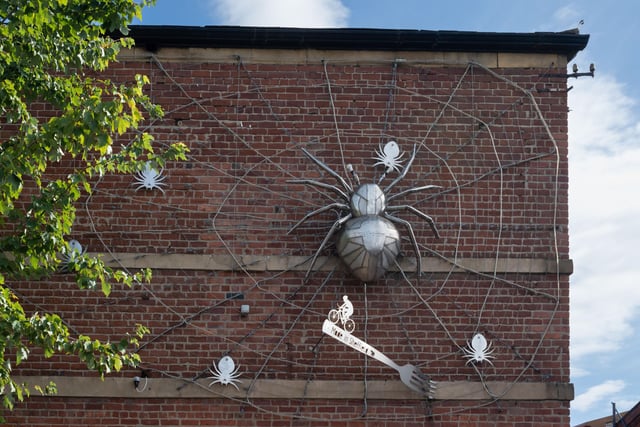 This giant spiderweb and spiders on the side of the Gripple building on the corner of Firth Drive and Saville Street, in Attercliffe, Sheffield, was created by Johnny White