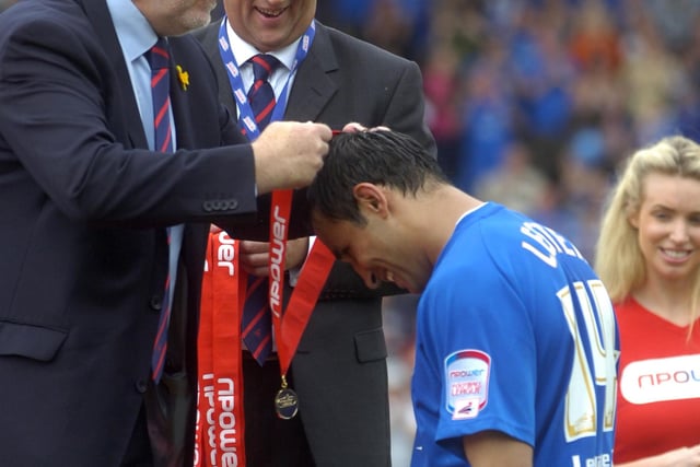 Jack Lester receives his League Two champions medal in 2011.