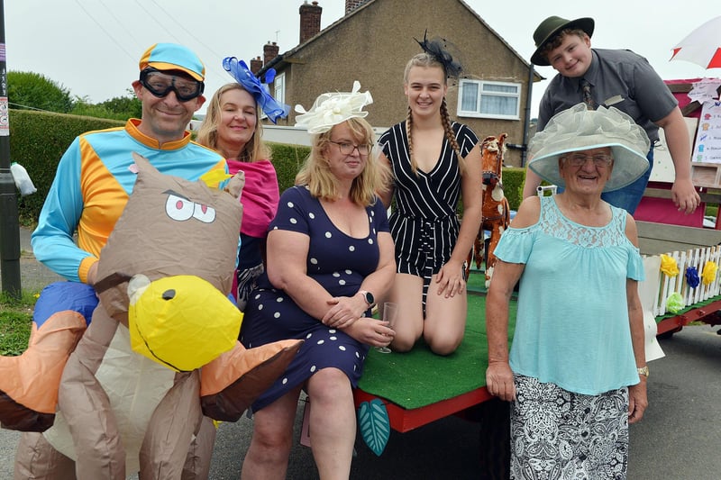 Wilkin Hill residents don their best hats for a day at the races.