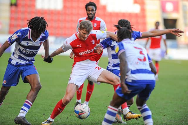 Rotherham United's Michael Smith tries to find a path through Reading during their Championship match at the New Yorks Stadium on Saturday