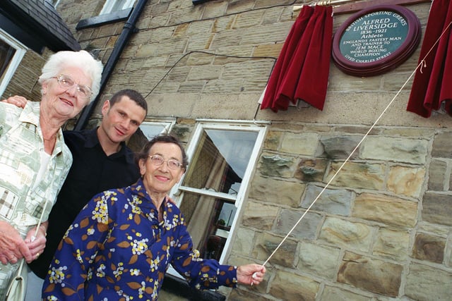 Pictured at the unveiling of a memorial plaque to Swinton 'Forgotten sporting hero' Alf Liversidge at the Station Hotel, Swinton, are his two Great Grandaughters Alice Scholey (left) and Emily Gittings along with present day Boxing hero John Jo Irwin.