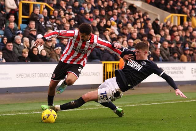 Sheffield United's Iliman Ndiaye sits down Leeds loanee Charlie Cresswell in another moment of magic: Warren Little/Getty